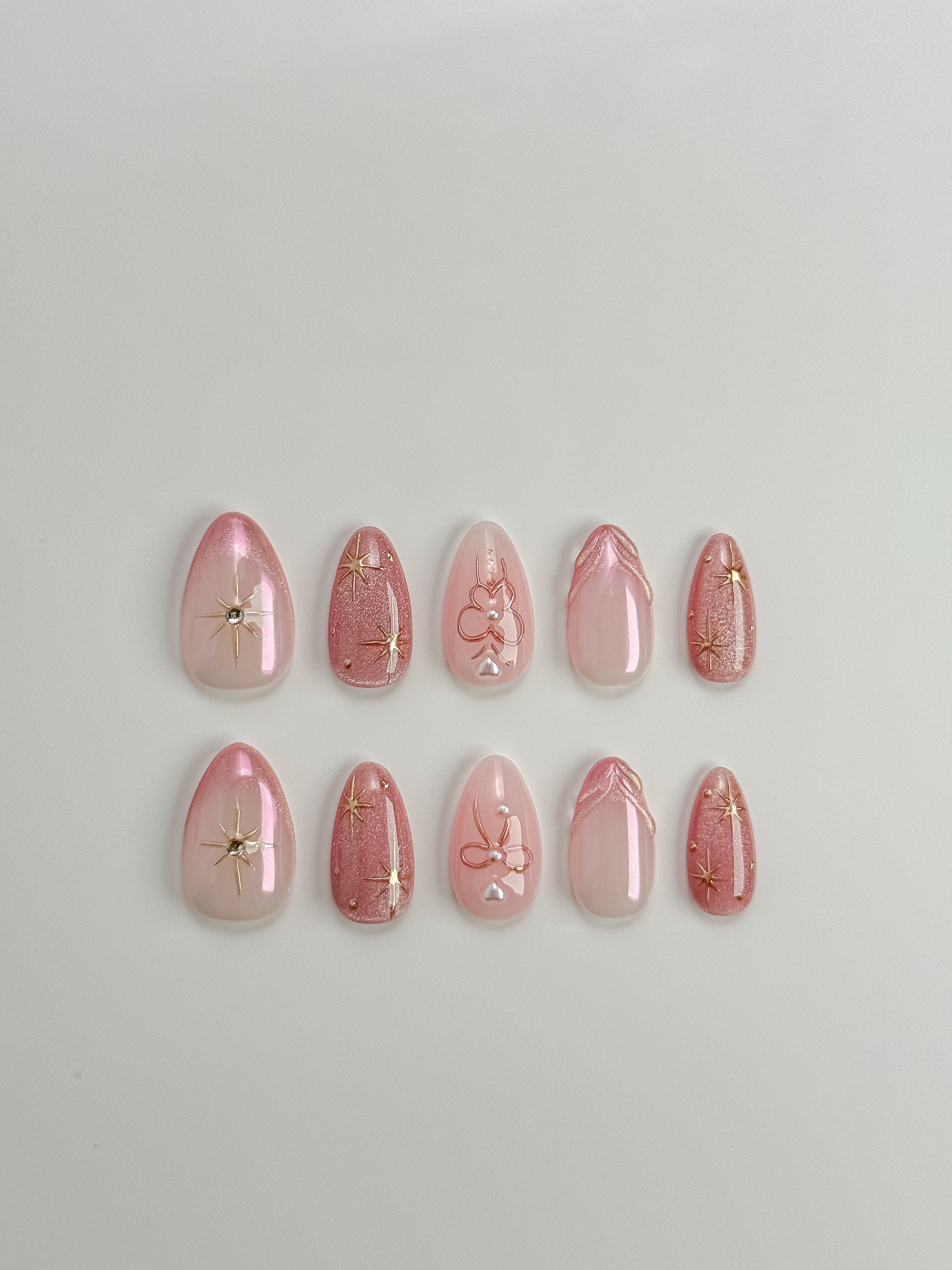 Stardust Charm Press-On Nägel – Rosa Schimmer Look