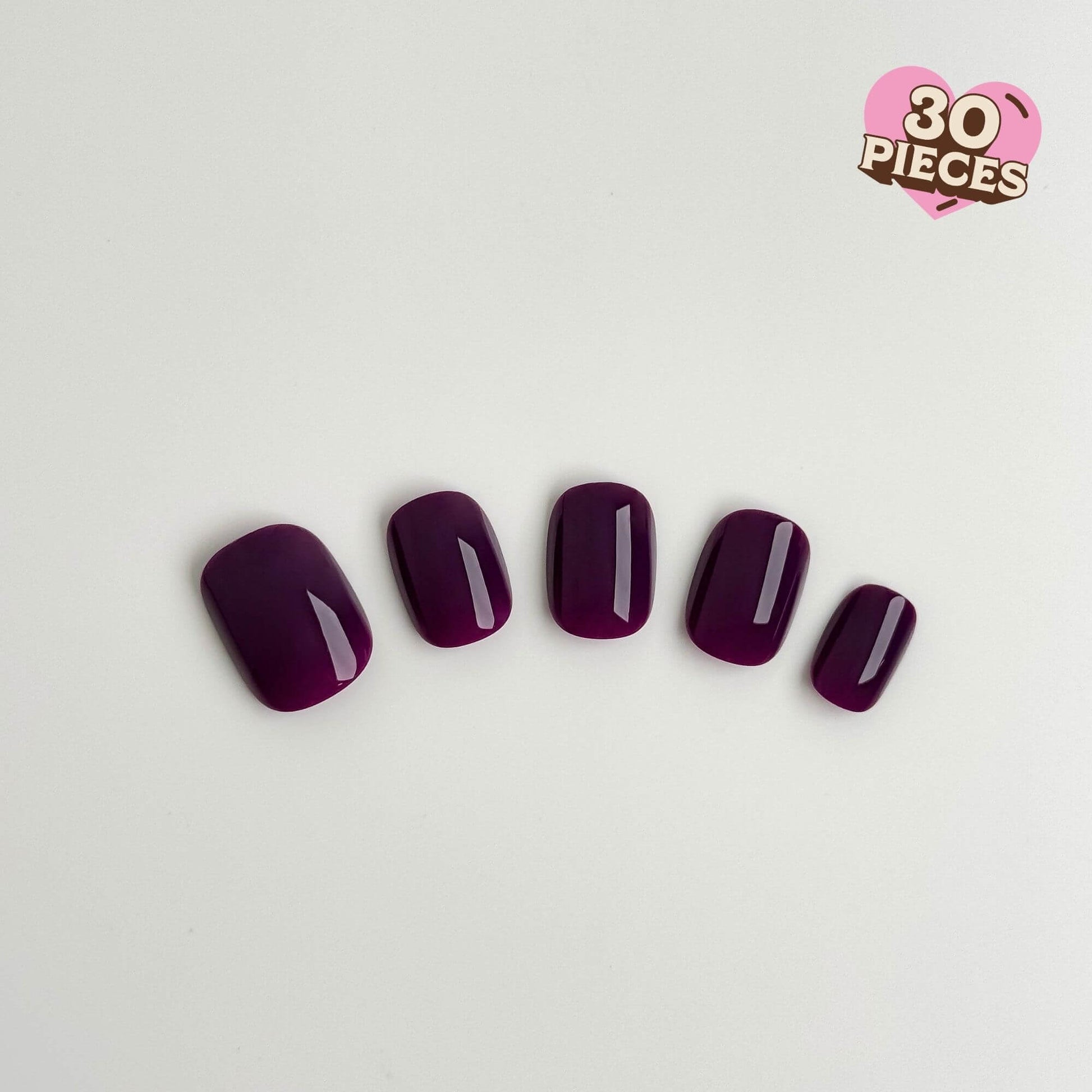 Five glossy dark purple press-on nails in a short square shape.