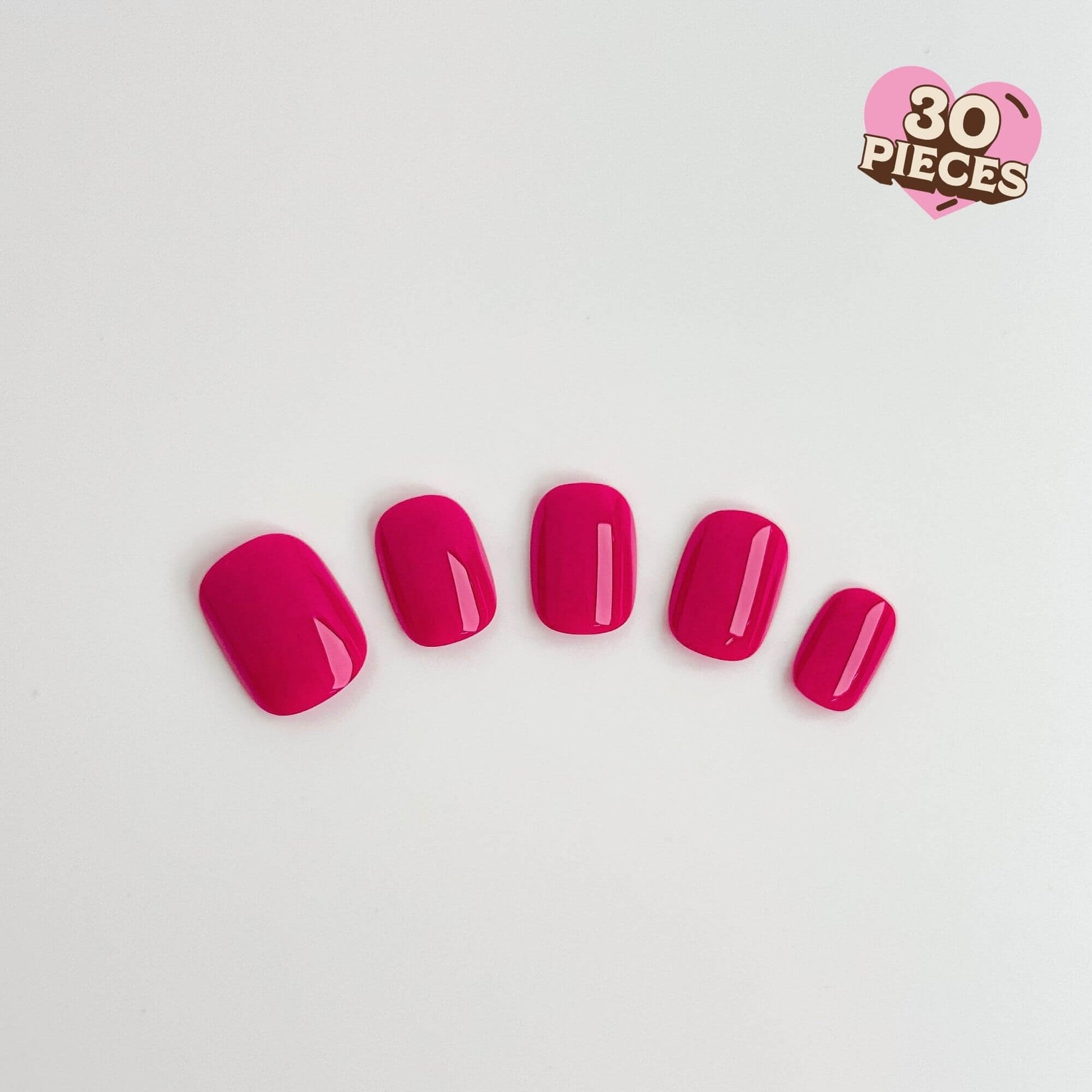 Leuchtend fuchsia-pinke Press-on-Nägel in kurzer runder Form mit glänzendem Profi-Finish.