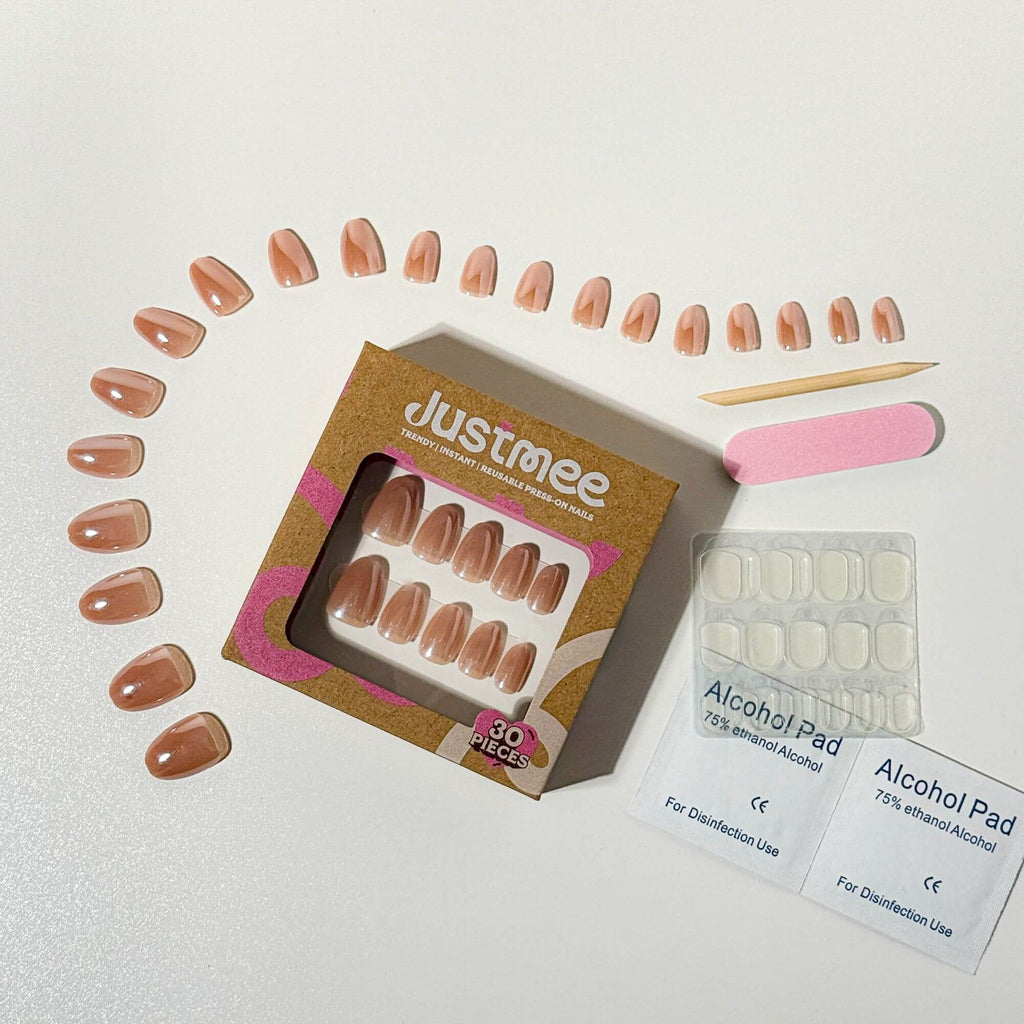 Justmee professional press-on nail kit: 30 mauve chrome artificial nails, short almond shape, with adhesive tabs and file.