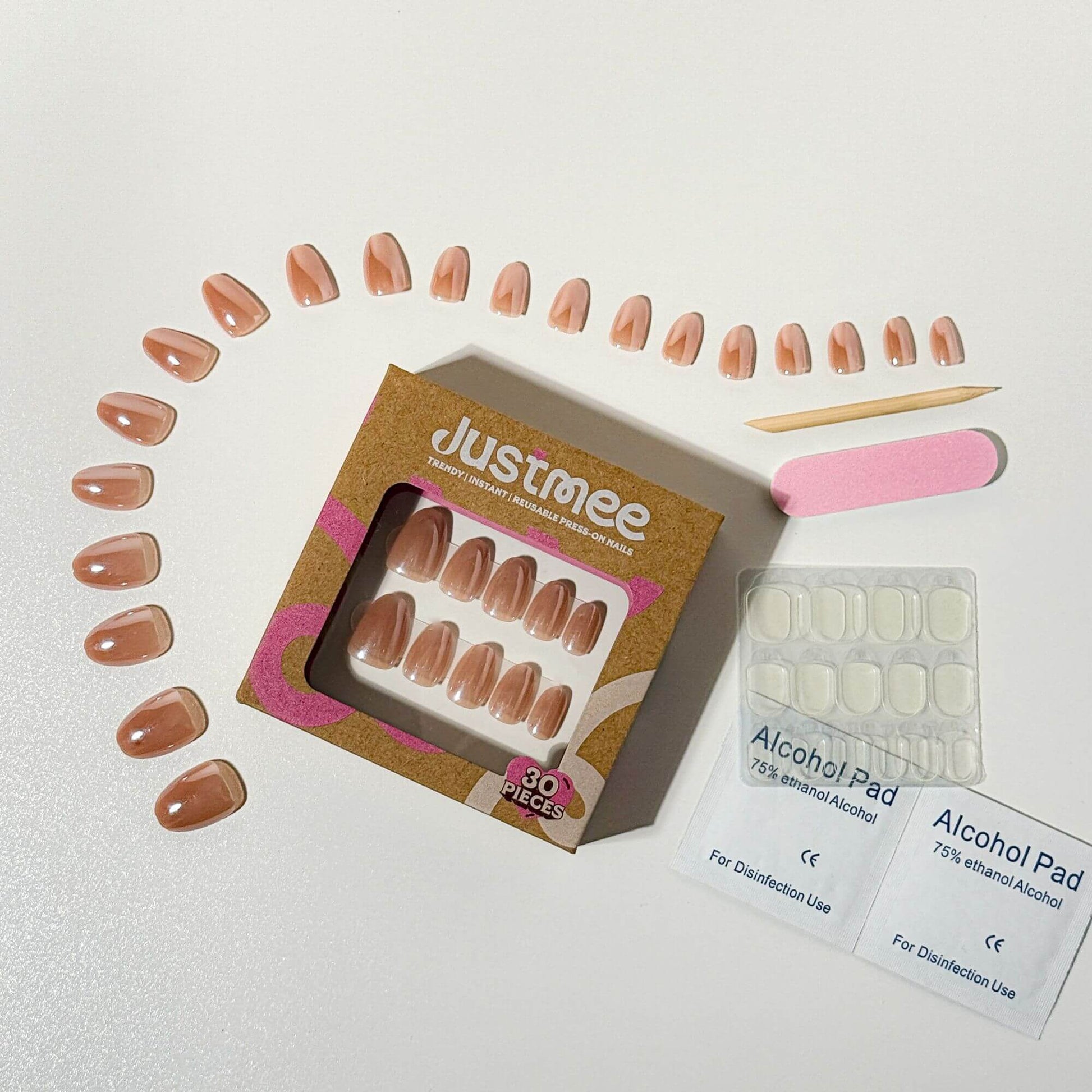 Justmee professional press-on nail kit: 30 mauve chrome artificial nails, short almond shape, with adhesive tabs and file.