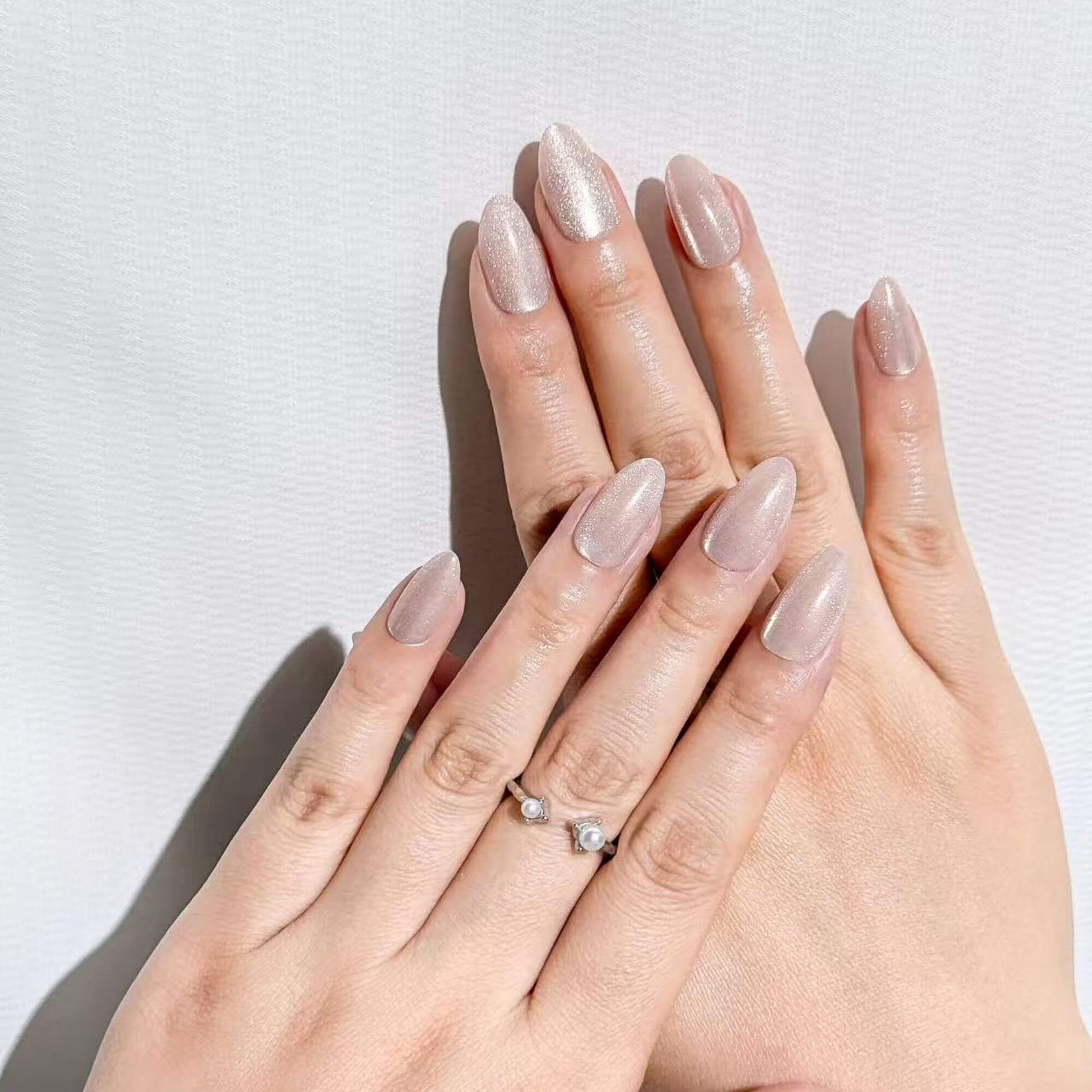 Natural manicure look with Justmee Moonveil soft shimmer stick-on nails, perfect for a subtle and elegant daily style.