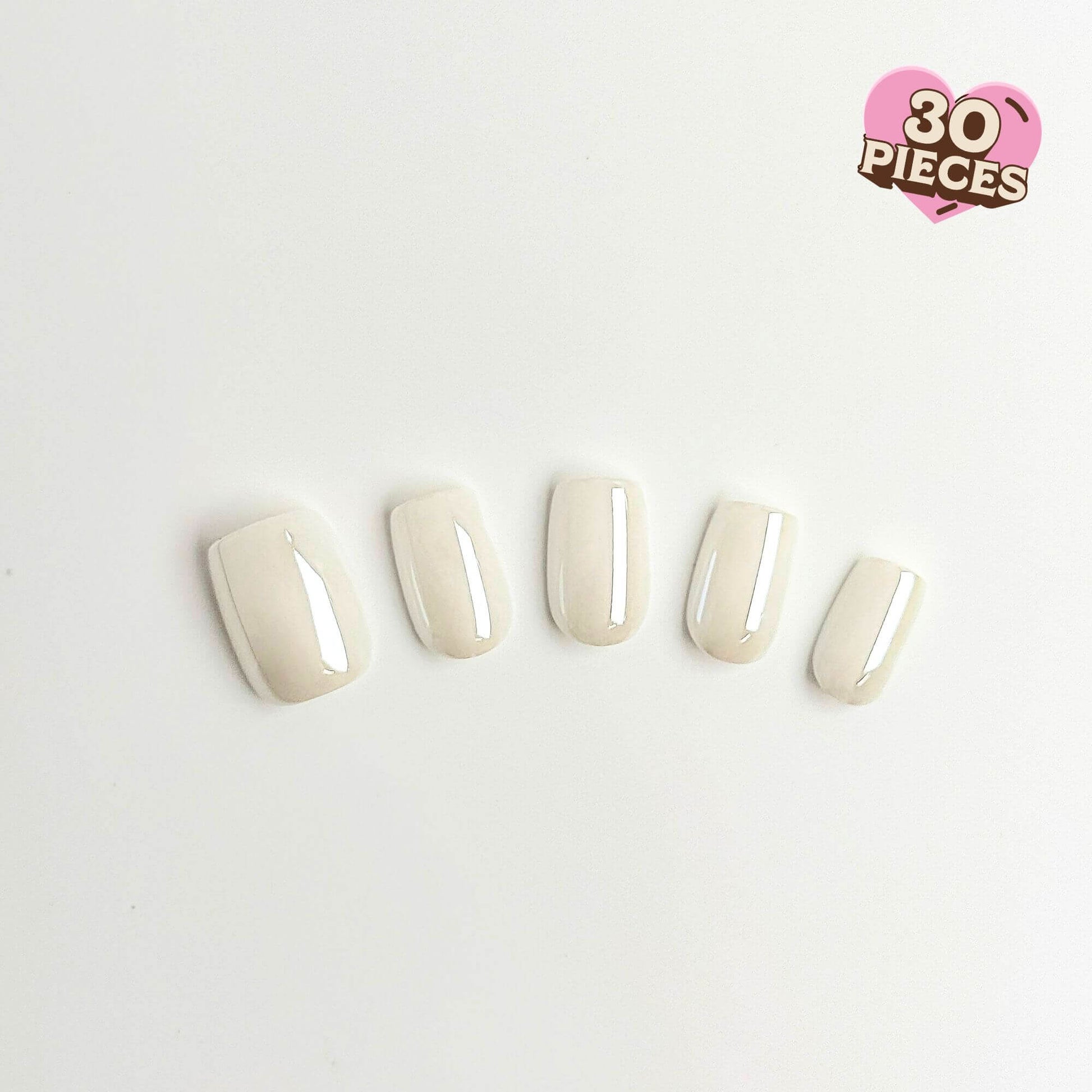 Five glossy pearl white press-on nails in a short square shape.