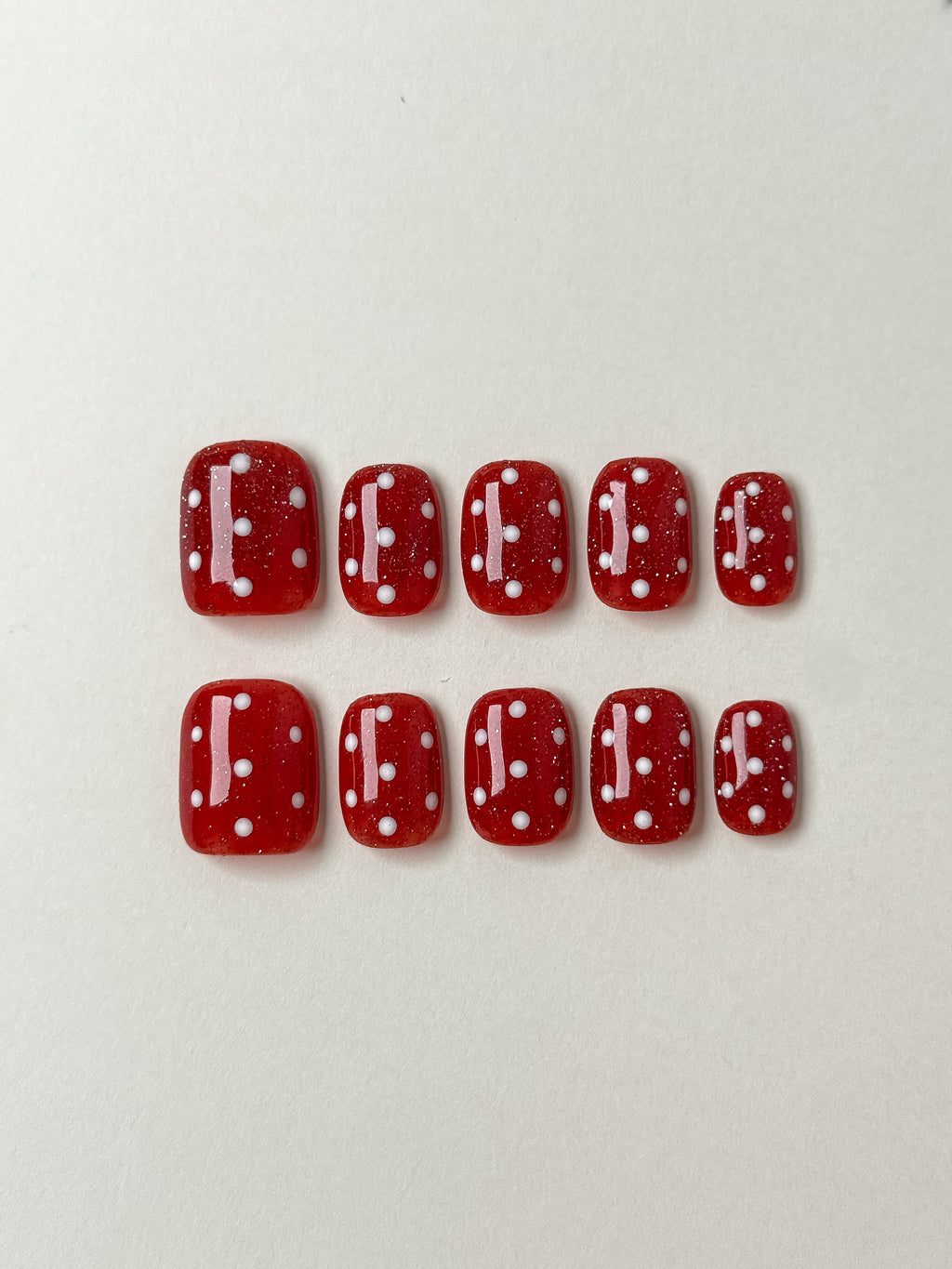 10 pieces of justmee press on nails, red color, square shape with white dots on top. perfect for a festival season like christmas