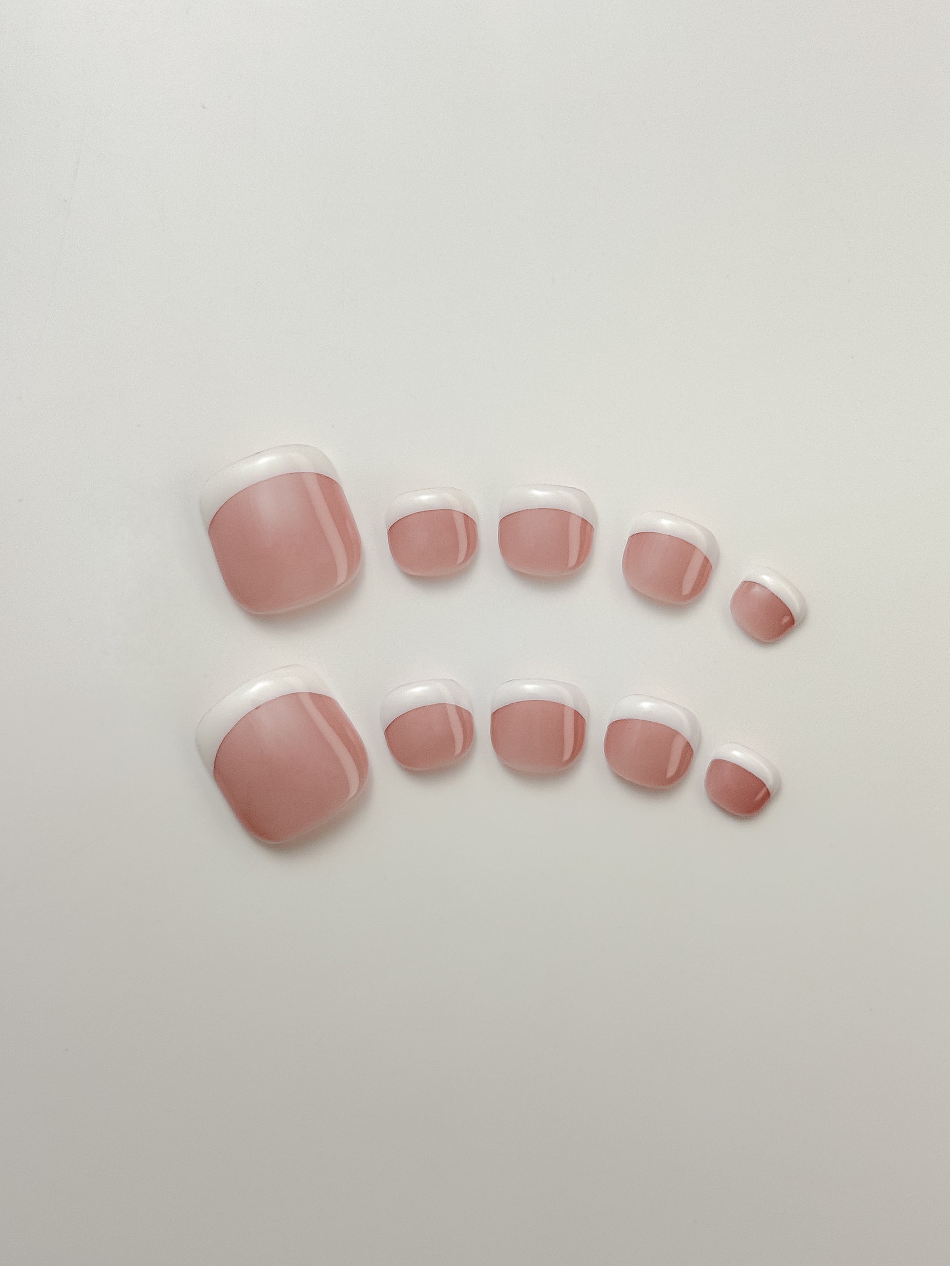 Square French tip press-on toenails in nude and white, 10-piece set